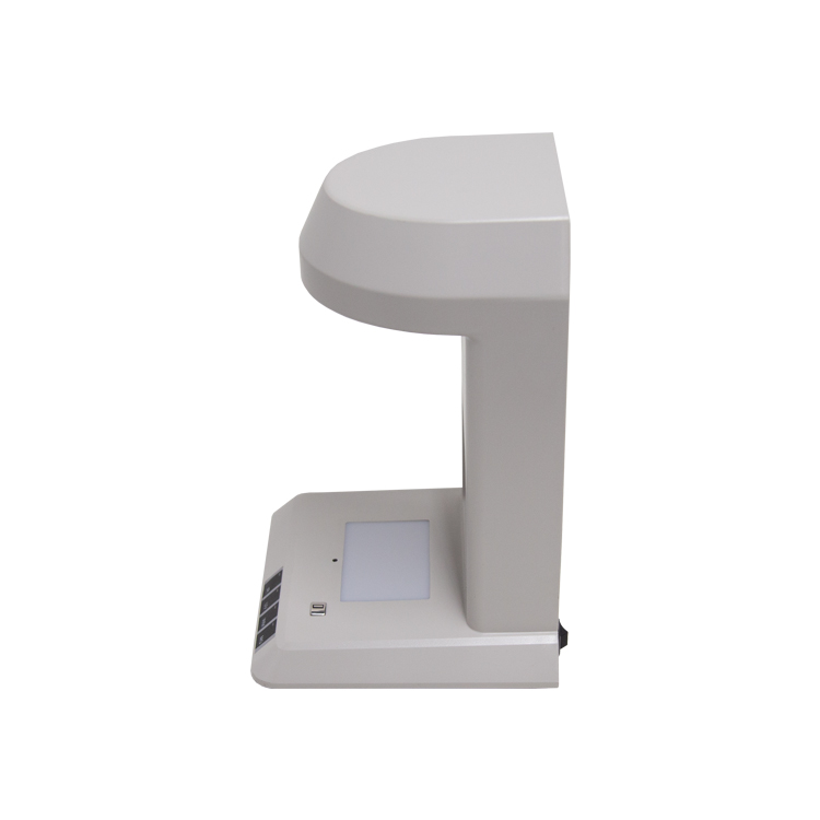 DC-108KW counterfeit money detector on white background